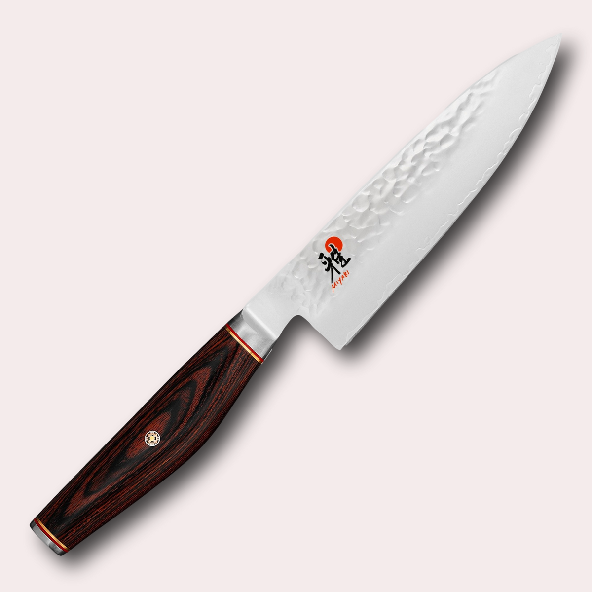 Miyabi 6000MCT 16cm Gyuto chefs knife. 3 layer steel blade with hammered finish, and decorative brown pakkawood handle. Supplied by japanese-knives.co.uk