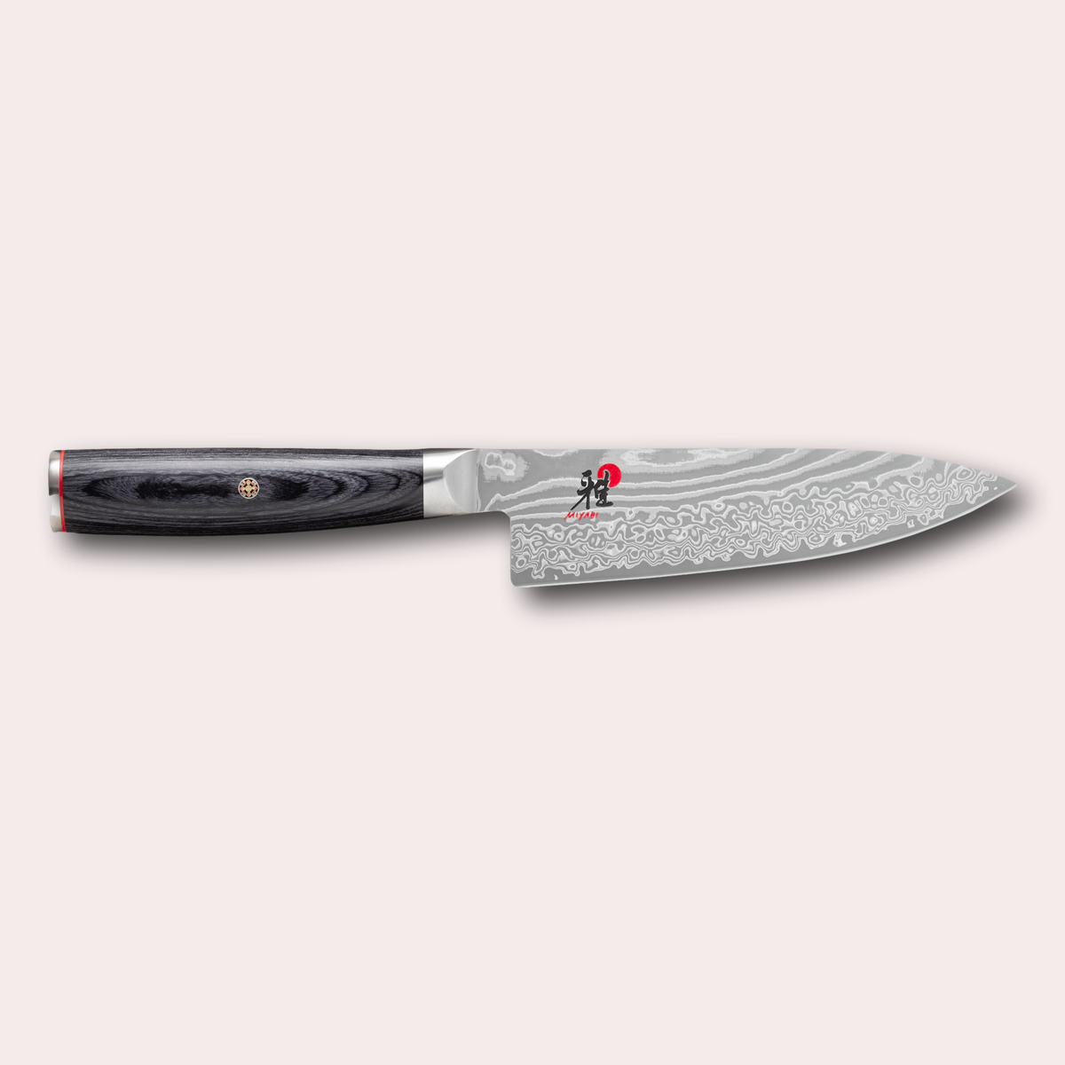 Miyabi 5000FCD 16cm Gyuto chef knife. Damascus blade and black pakkawood handle with decorative through-pins. japanese-knives.co.uk