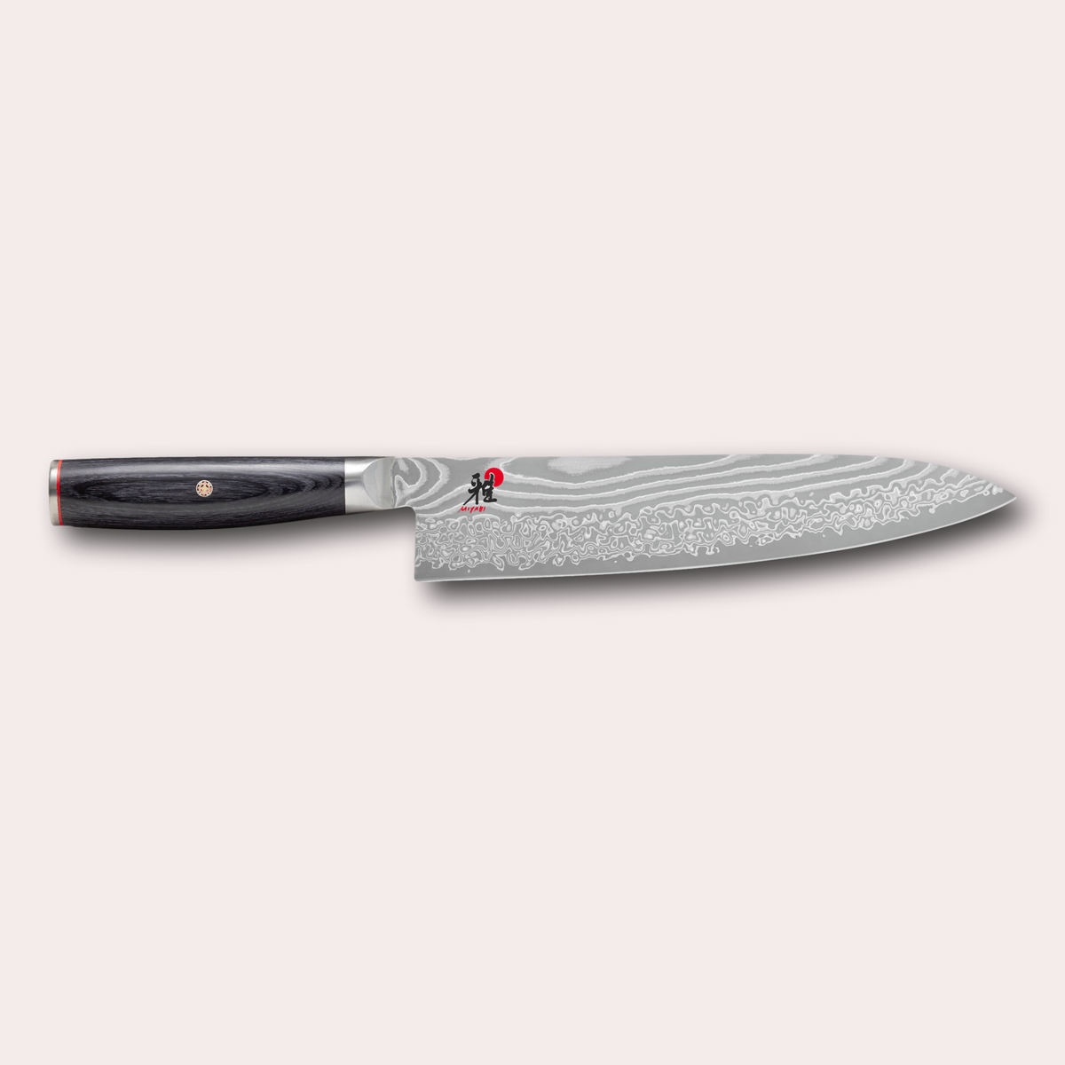 Miyabi 5000FCD 24cm Gyuto chefs knife. Damascus blade and black pakkawood handle with decorative through-pins. japanese-knives.co.uk