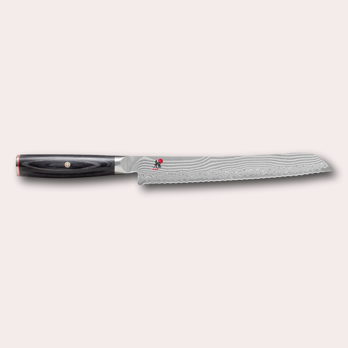 Miyabi 5000FCD Bread knife. Damascus blade and black pakkawood handle with decorative through-pins. japanese-knives.co.uk