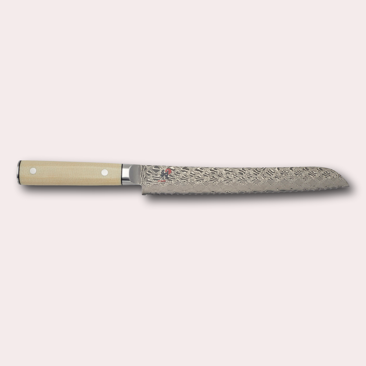 Miyabi 4500FCD bread knife. Made in Japan, stunning Damascus blade and a sculpted micarta handle. japanese-knives.co.uk