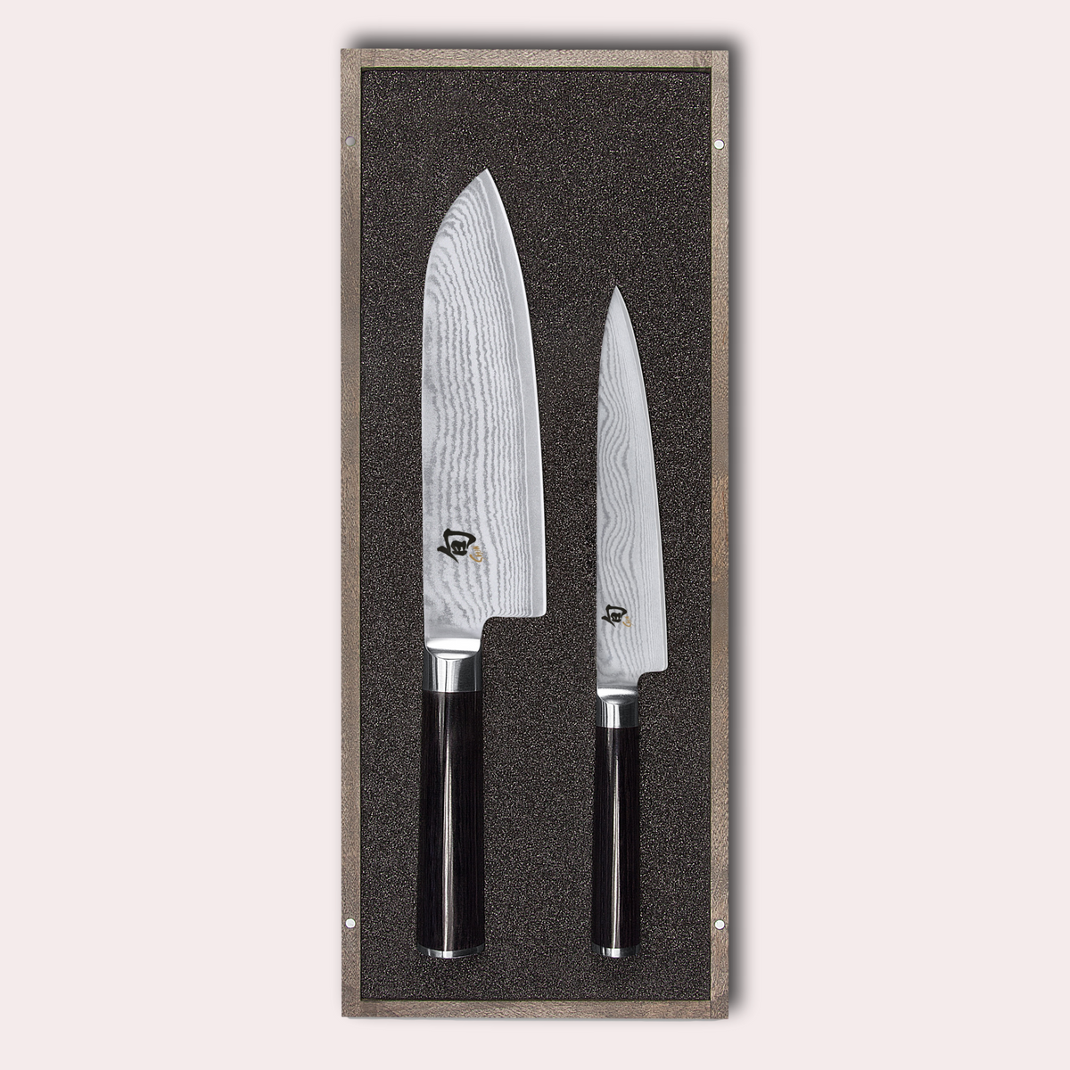KAI Shun 2 piece set, santoku and utility knives. Damascus blade with razor sharp edge and black pakkawood handle.