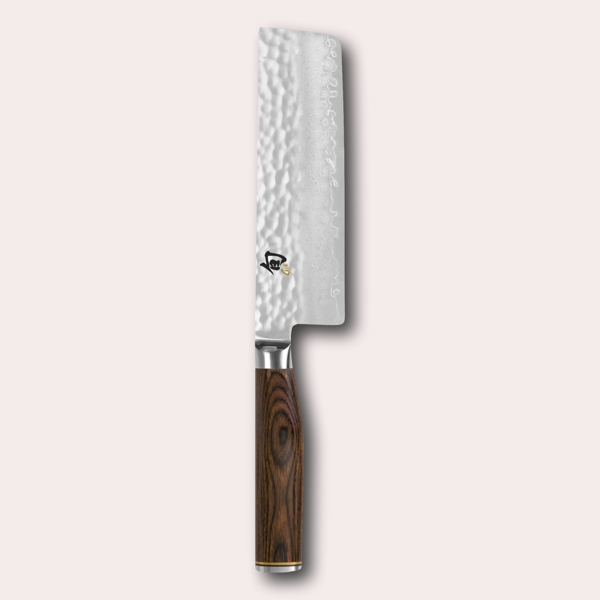 Kai Shun Premier nakiri knife. VG max blade wrapped in 32 layers of Damascus steel with a hammered finish, and brown pakkawood handle. japanese-knives.co.uk