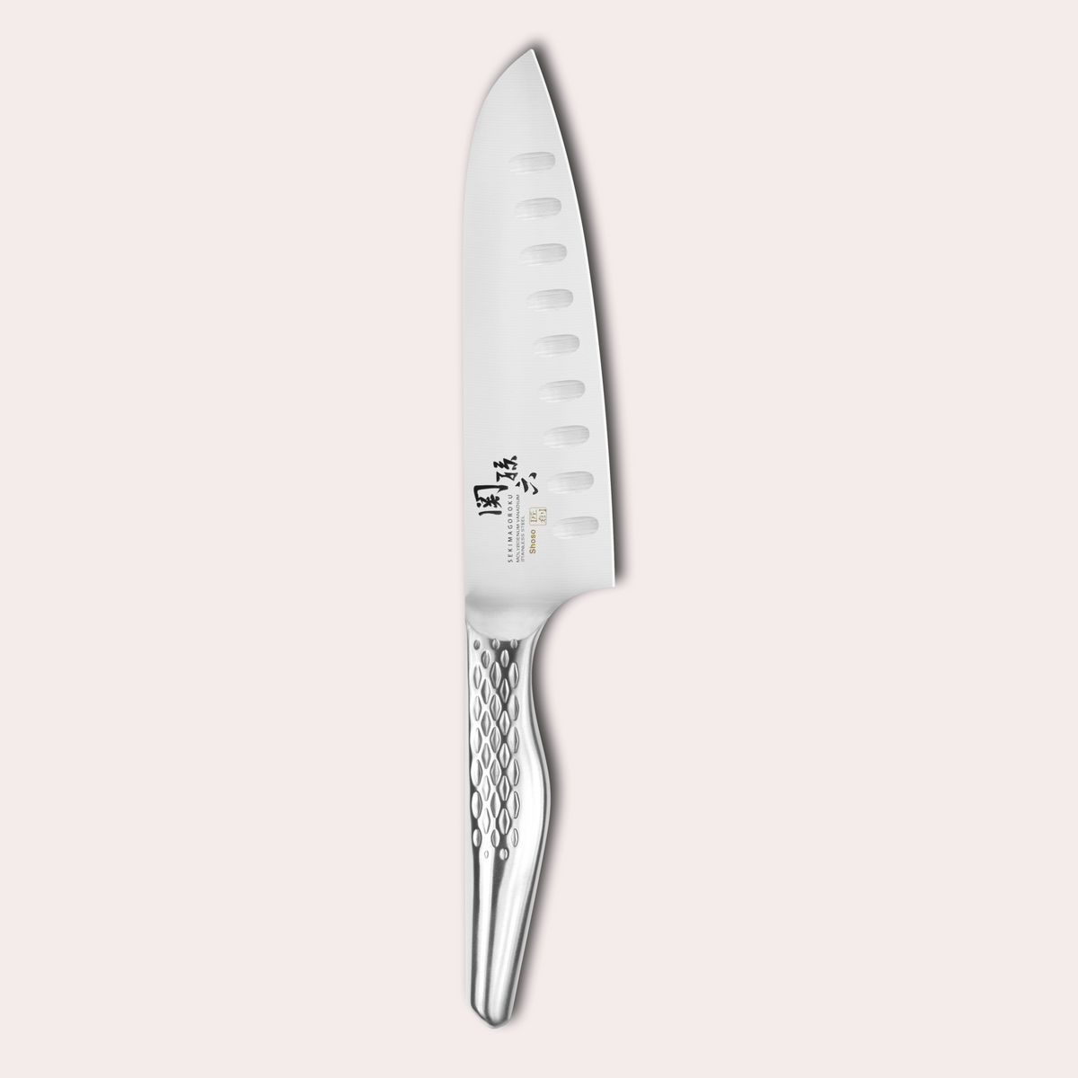 Kai Seki Magoroku Shoso Santoku knife. 5CR15MoV Steel with diamond pattern handle.