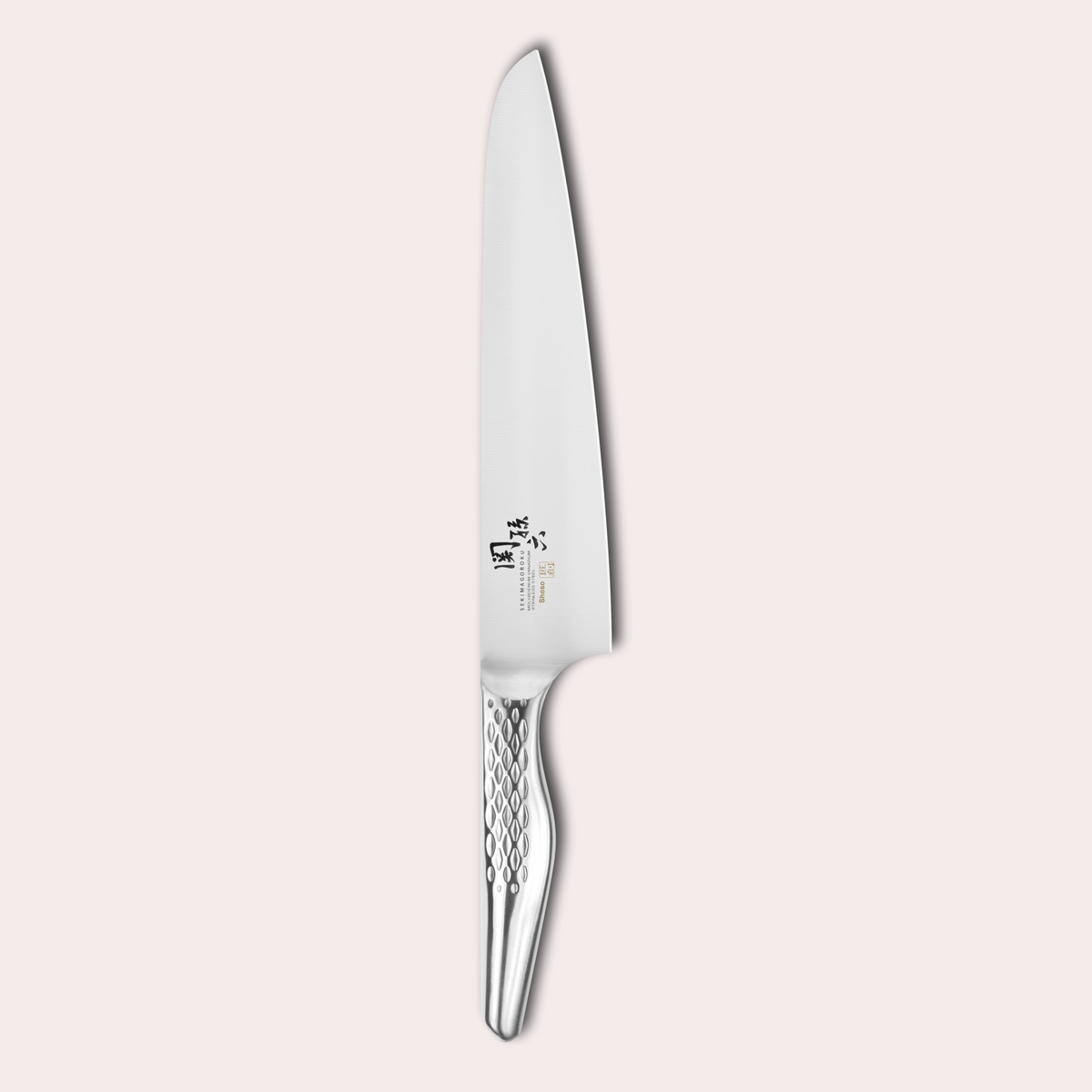 Kai Seki Magoroku Shoso Chef knife. 5CR15MoV Steel with diamond pattern handle.