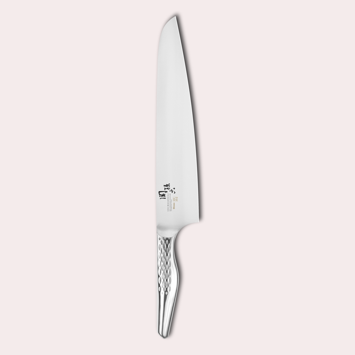 Kai Seki Magoroku Shoso Chef knife. 5CR15MoV Steel with diamond pattern handle.