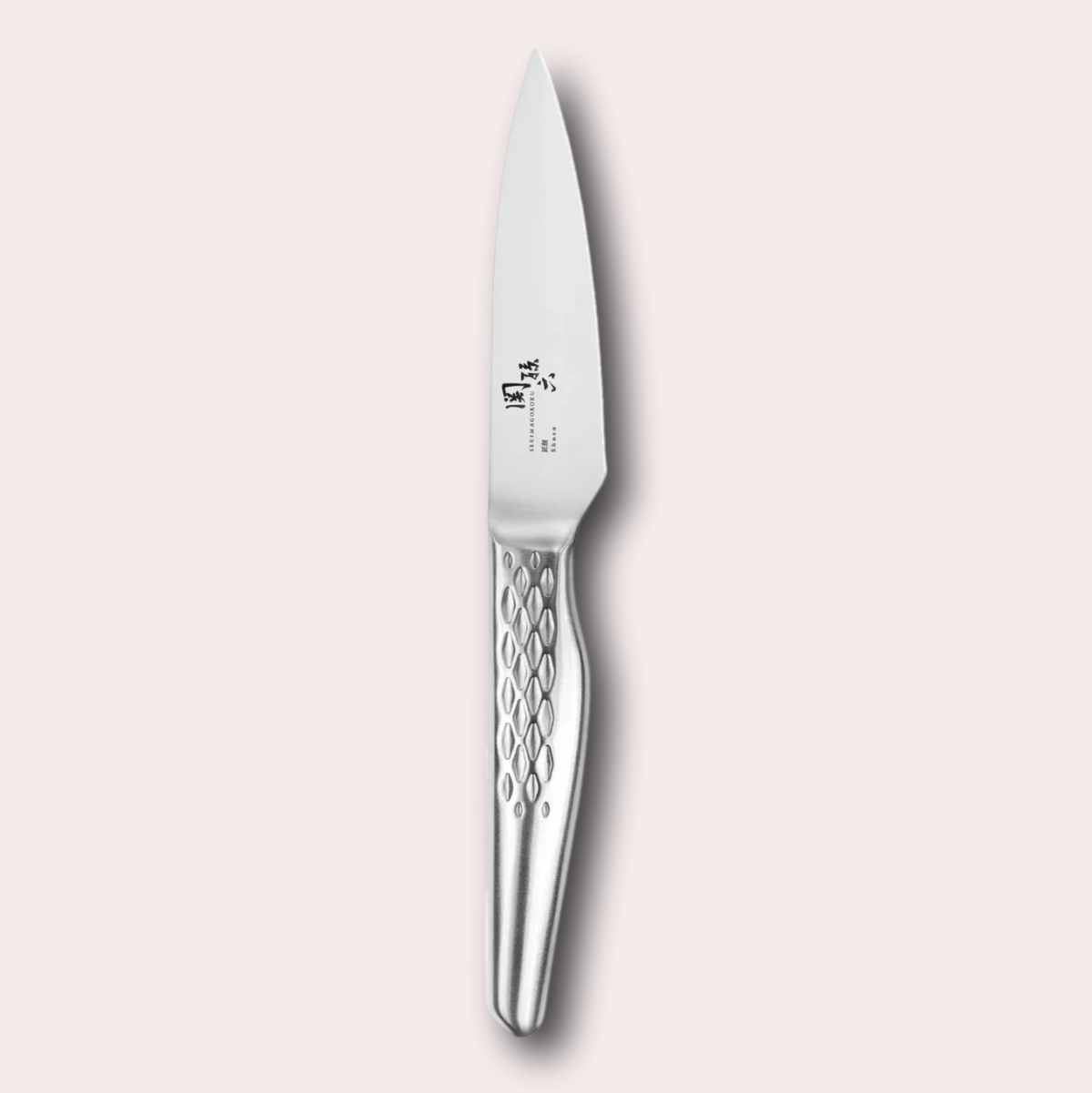 Kai Seki Magoroku Shoso paring knife. 5CR15MoV Steel with diamond pattern handle.