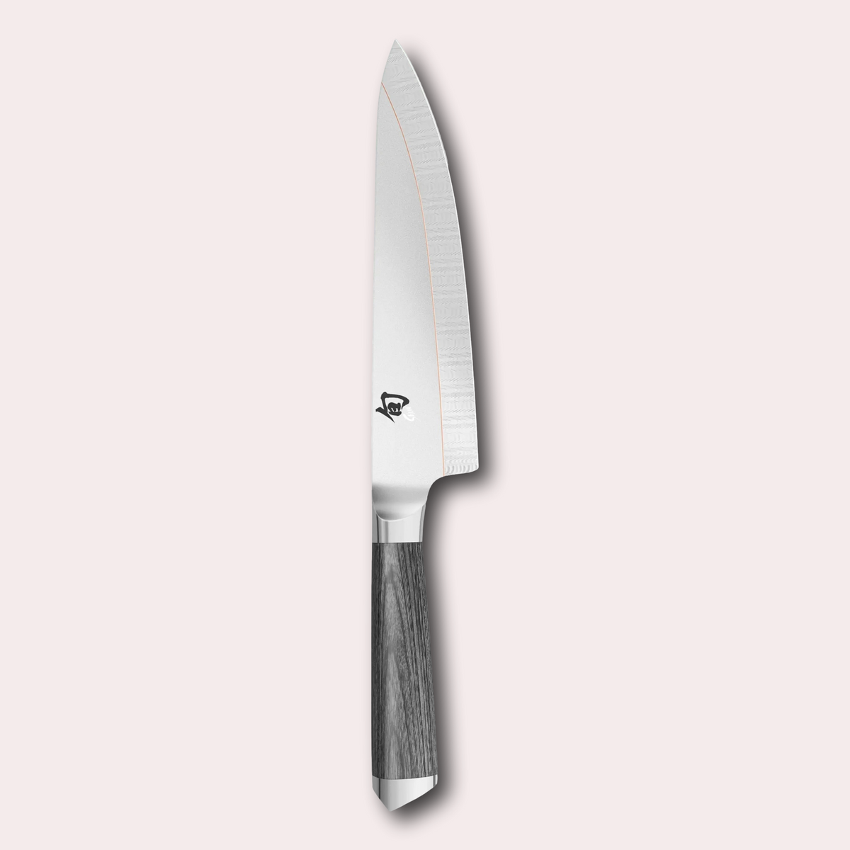 Kai Shun Kagerou Gyuto chef knife. 2 part blade of polished and dual-core Damascus Steel with a copper flash line. Mottled grey pakkawood handle complete with a Shun logo end cap.