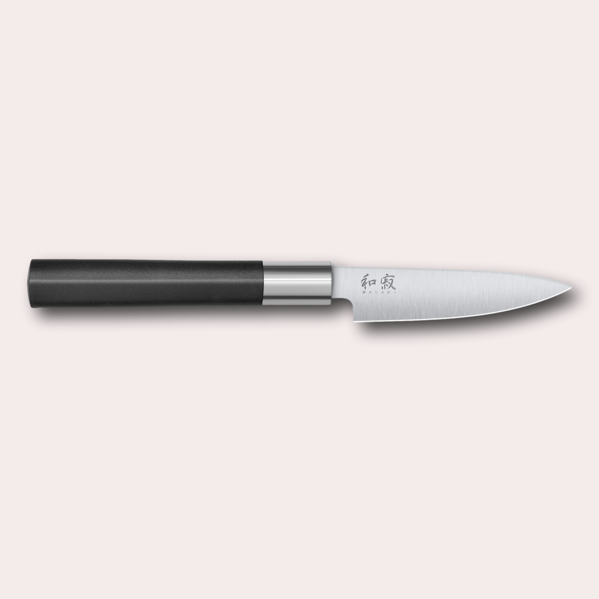 Kai Wasabi Black utility knife. Corrosion-resistant 6A/1K6 steel, matte black oval shaped plastic handle.