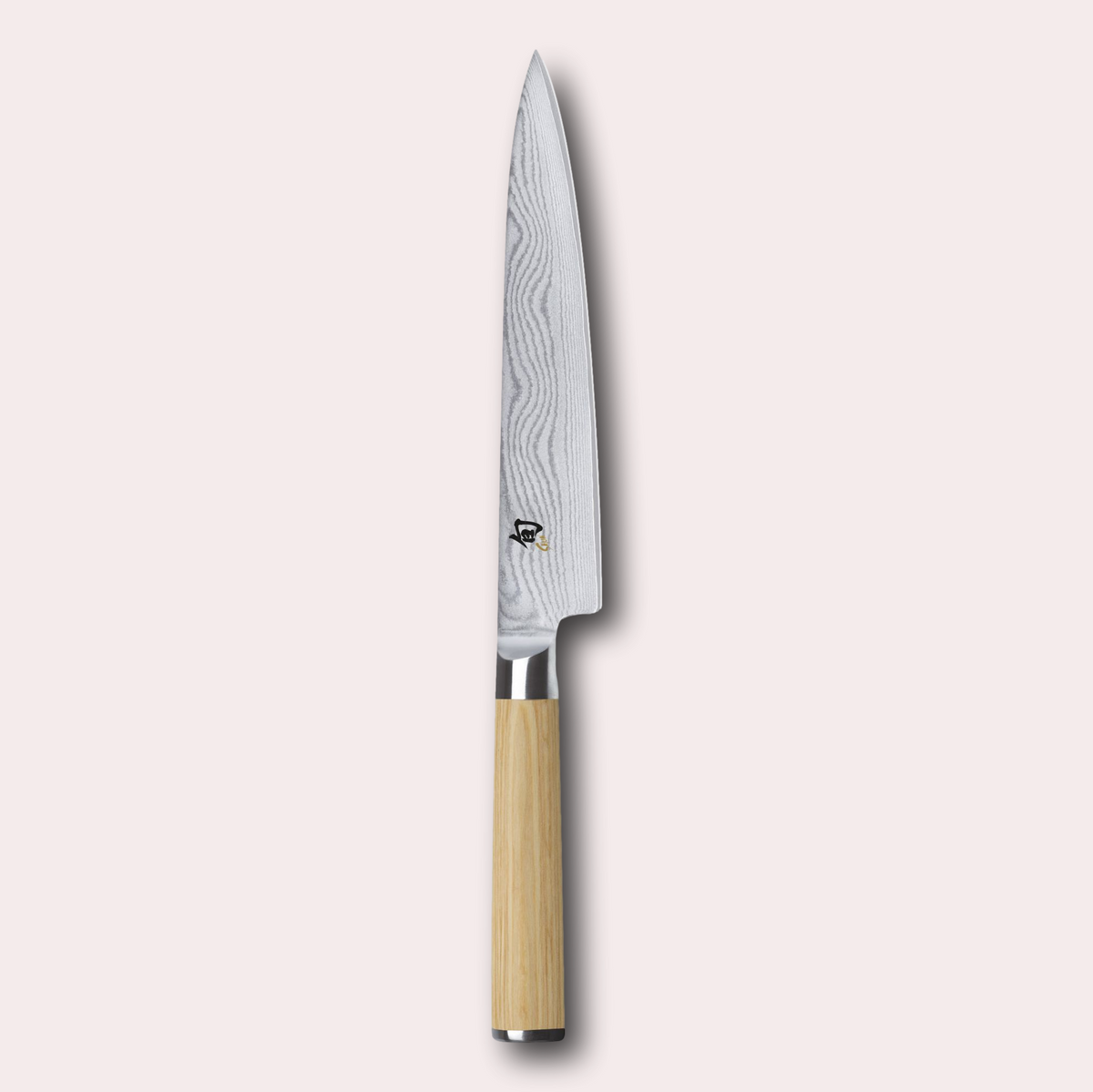 Kai Shun White 15cm utility knife. Light ash coloured pakkawood handle, meets a VG Max steel core blade wrapped in 32 layers of Damascus Steel.