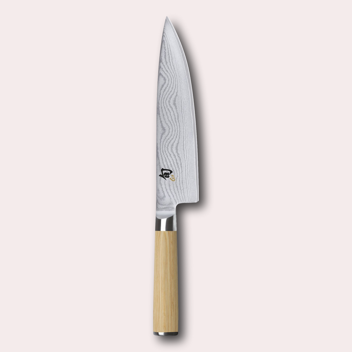 Kai Shun White 20cm chef knife. Light ash coloured pakkawood handle, meets a VG Max steel core blade wrapped in 32 layers of Damascus Steel.
