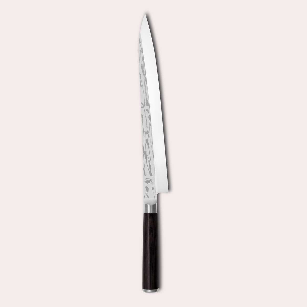 Kai Shun Pro Sho slicing knife. VG10 steel honed on one side only. Decorative blade design and black pakkawood handle. japanese-knives.co.uk