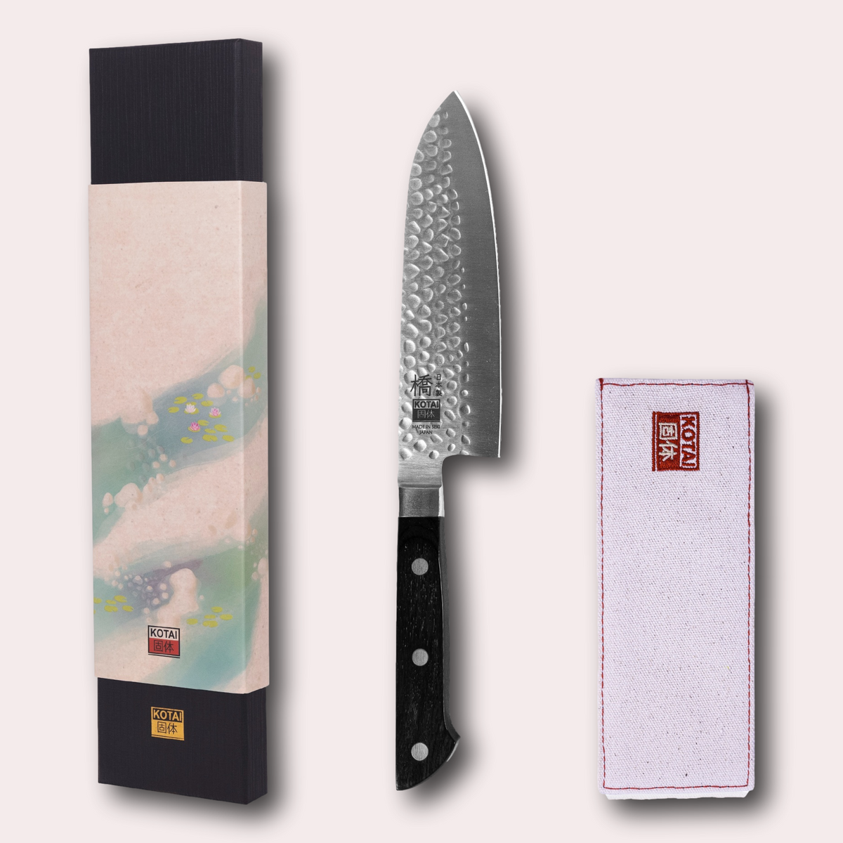 Kotai Hashi Tsuchime Santoku knife. Hammered finish blade and pakkawood sculpted handle. Supplied by japanese-knives.co.uk
