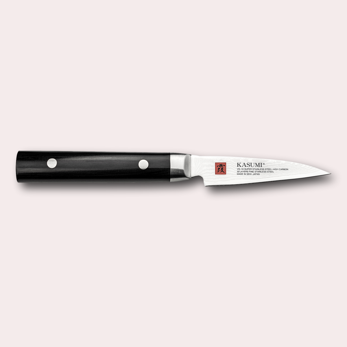 Kasumi Damascus paring knife. 32 layers damascus blade with a vg-10 core, and a black pakkawood handle. Sold by japanese-knives.co.uk