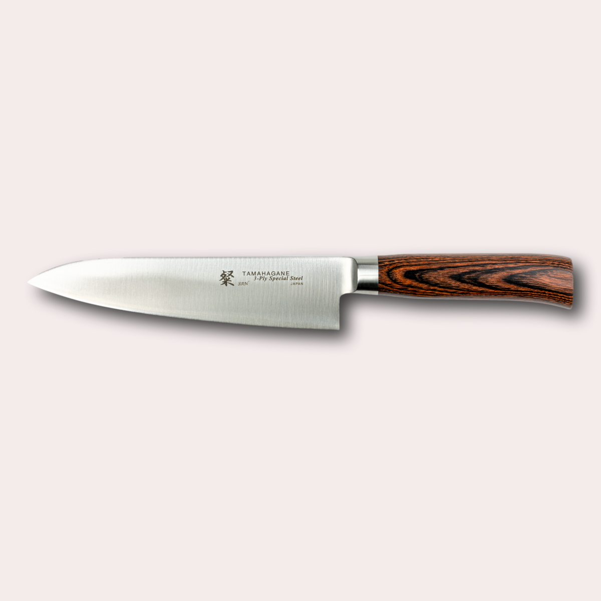 Tamahagane San 18cm chef knife, with 3 ply special steel blade, and brown micarta handle. Sold by japanese-knives.co.uk