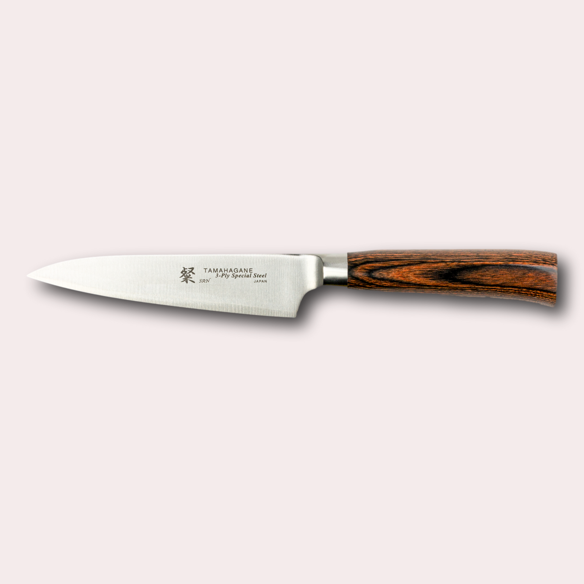 Tamahagane San 12cm paring and utility knife, with 3 ply special steel blade, and brown micarta handle. Sold by japanese-knives.co.uk
