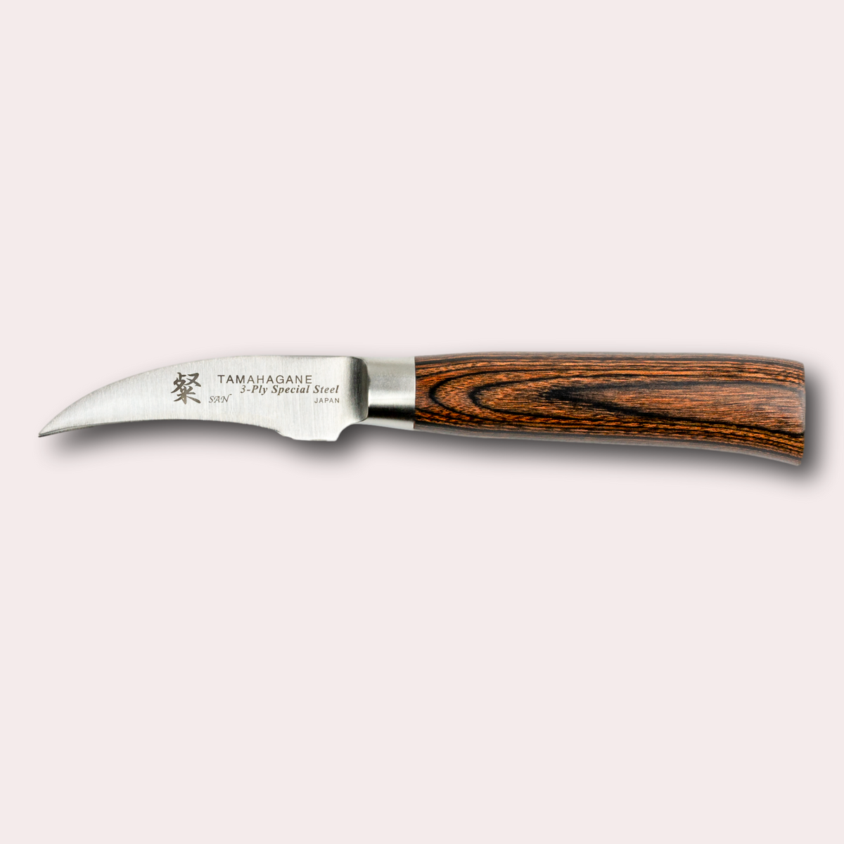 Tamahagane San birds beak peeling knife, with 3 ply special steel blade, and brown micarta handle. Sold by japanese-knives.co.uk