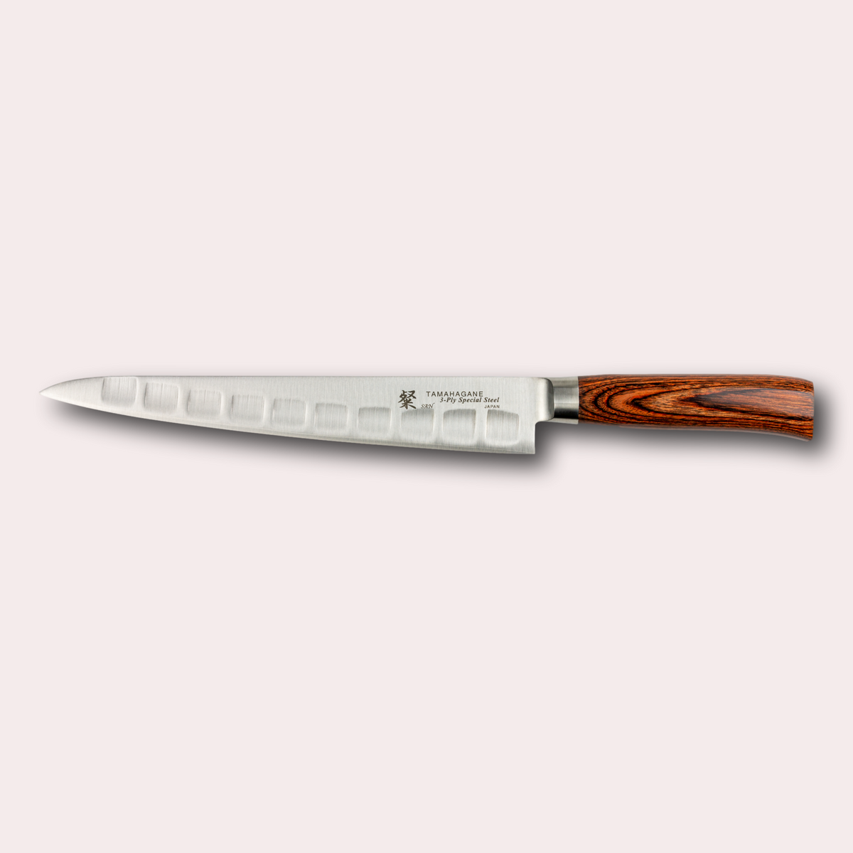 Tamahagane San fluted slicing knife, with special steel blade, and brown micarta handle. Sold by japanese-knives.co.uk
