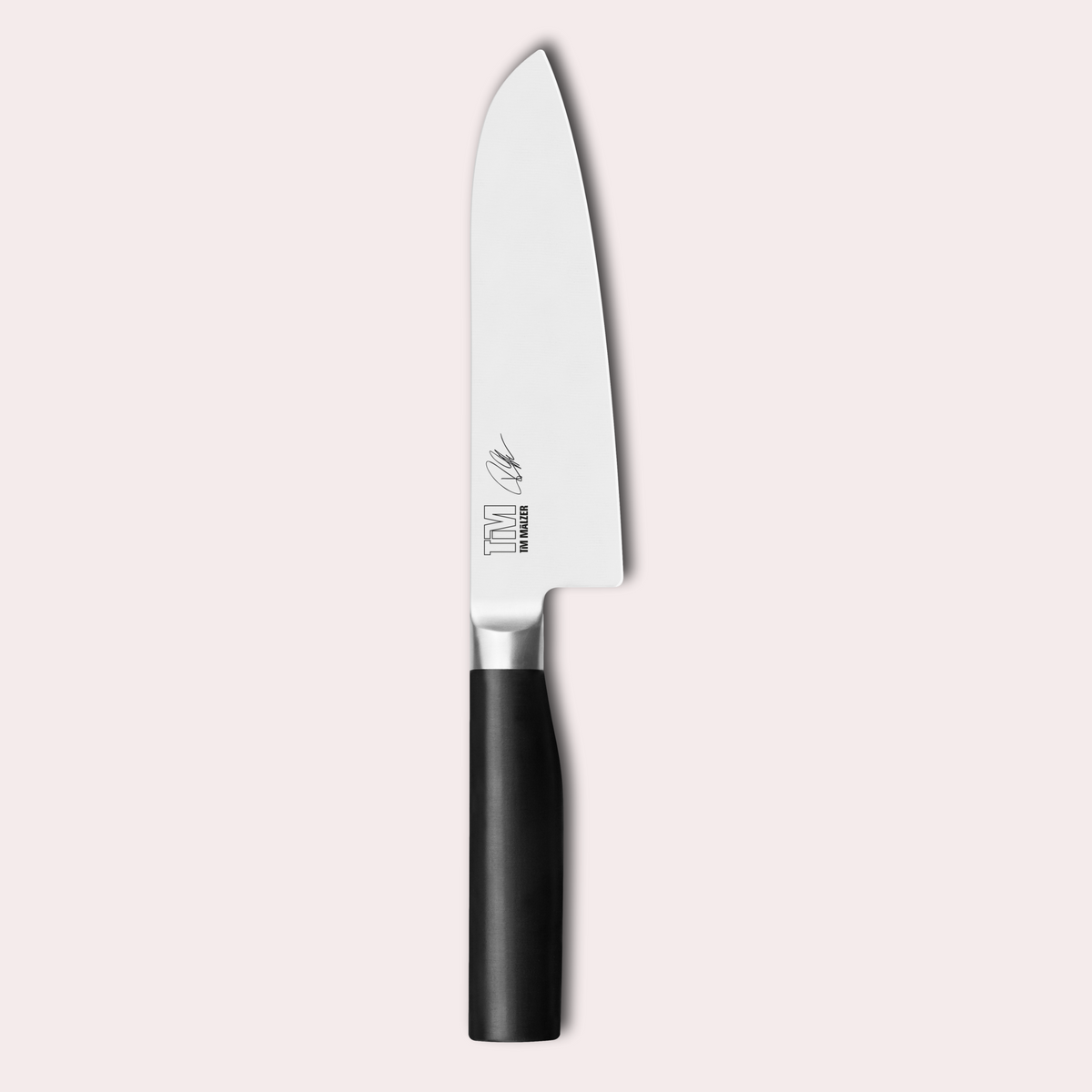 Tim Malzer designed Kai Kamagata Santoku knife. 4116 steel blade and POM handles. japanese-knives.co.uk