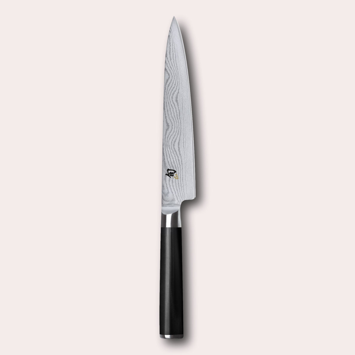 KAI Shun 15cm utility knife. Damascus blade with razor sharp edge and black pakkawood handle.