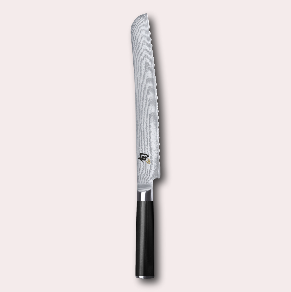 KAI Shun 23cm Bread Knife , damascus blade with razor sharp edge and black pakkawood handle.
