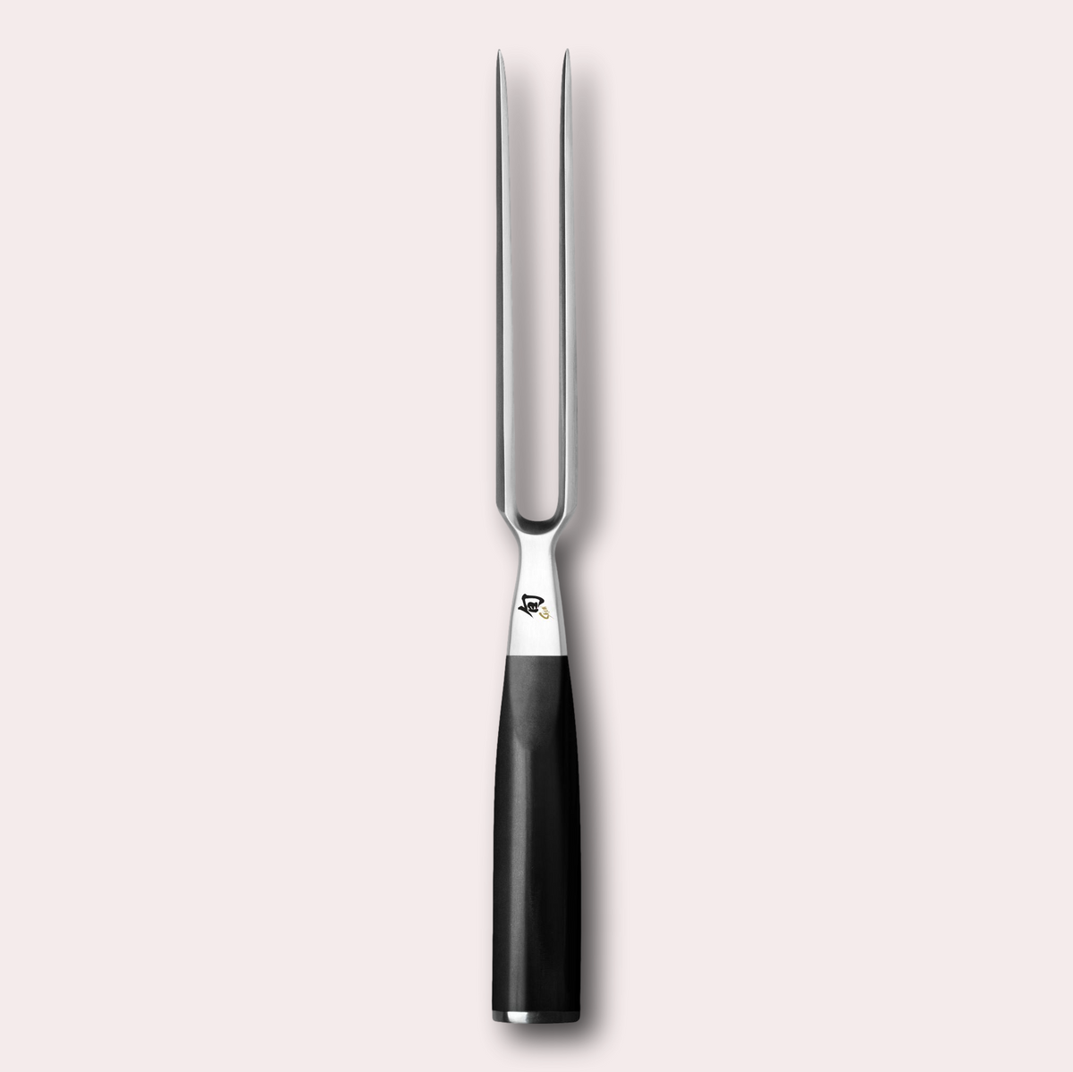 KAI Shun meat fork. Stainless steel prongs and black pakkawood handle.