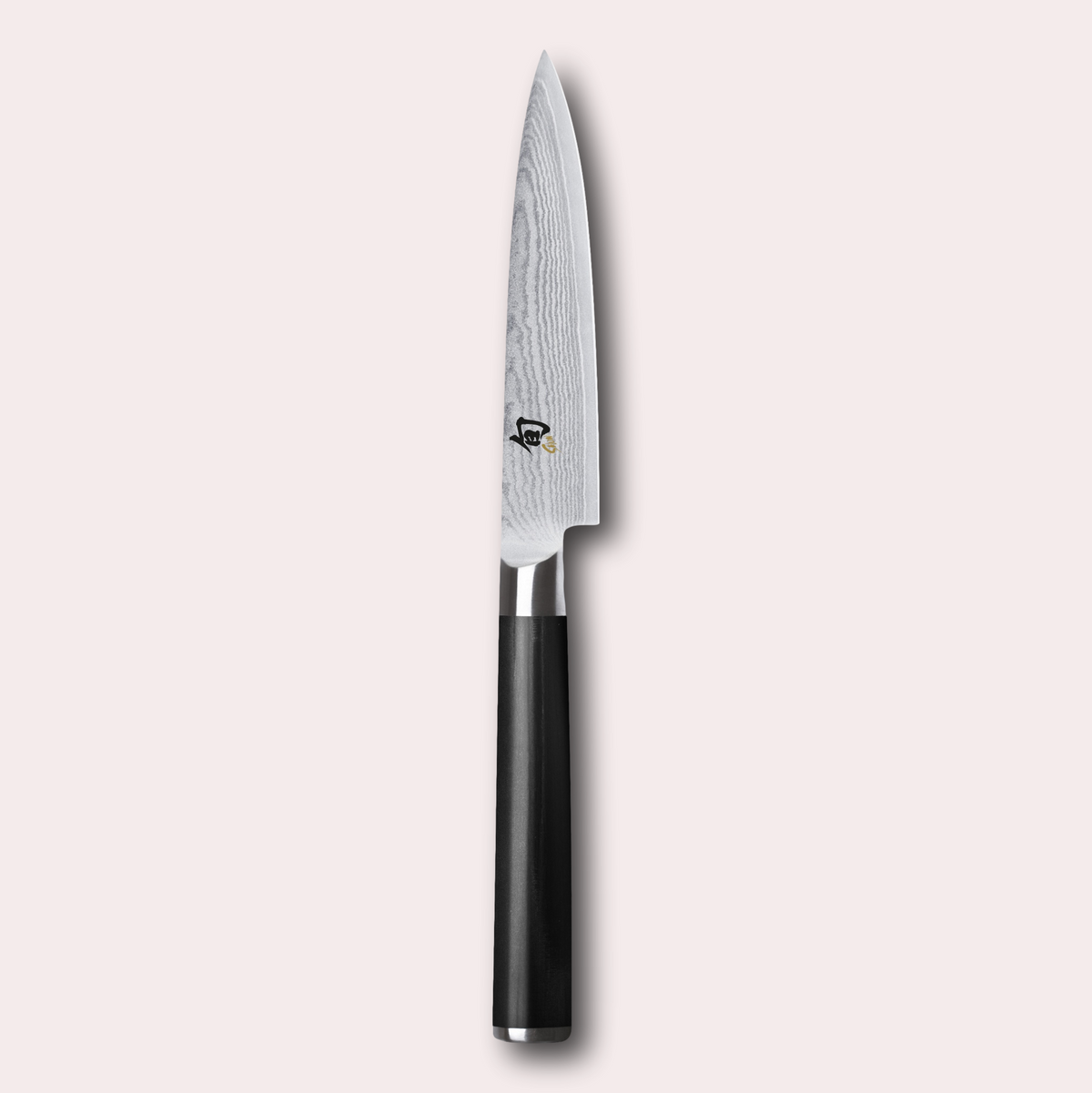 KAI Shun 10cm Paring Knife , damascus blade with razor sharp edge and black pakkawood handle.