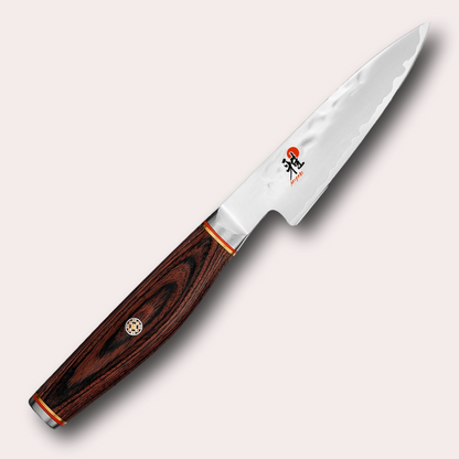 Miyabi 6000MCT 9cm Shotoh vegetable knife. 3 layer steel blade with hammered finish, and decorative brown pakkawood handle. Supplied by japanese-knives.co.uk