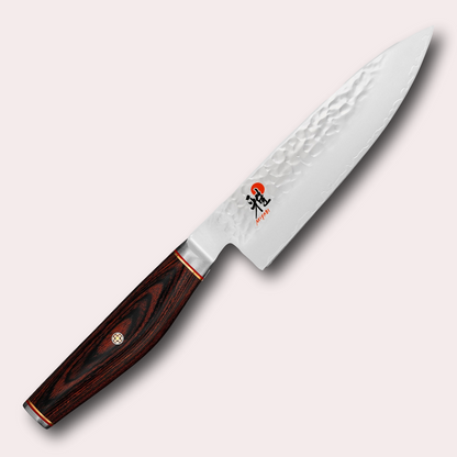 Miyabi 6000MCT 16cm Gyuto chefs knife. 3 layer steel blade with hammered finish, and decorative brown pakkawood handle. Supplied by japanese-knives.co.uk