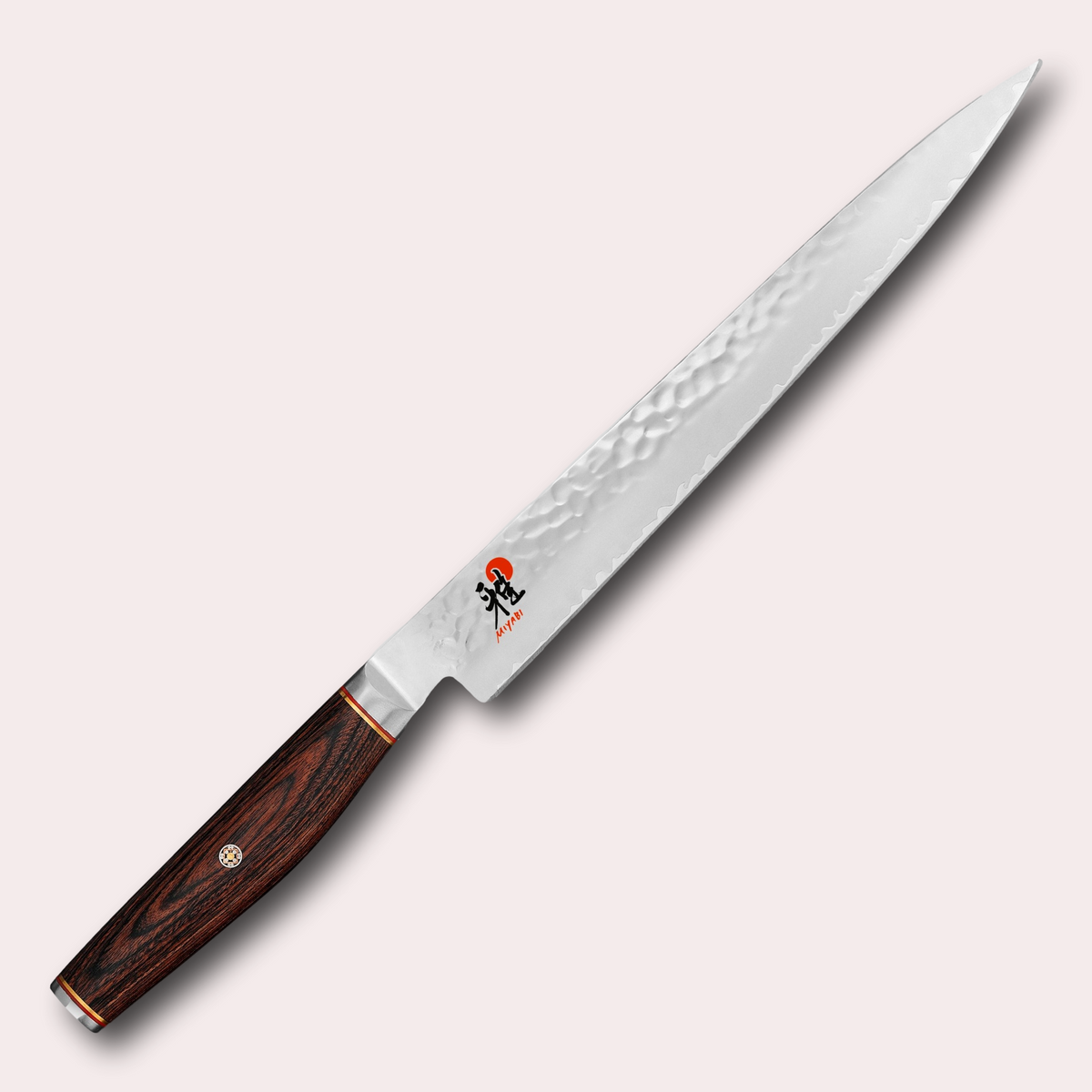 Miyabi 6000MCT 24cm Sujihiki slicing knife. 3 layer steel blade with hammered finish, and decorative brown pakkawood handle. Supplied by japanese-knives.co.uk