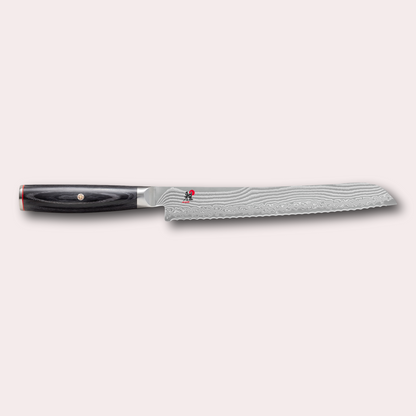 Miyabi 5000FCD Bread knife. Damascus blade and black pakkawood handle with decorative through-pins. japanese-knives.co.uk