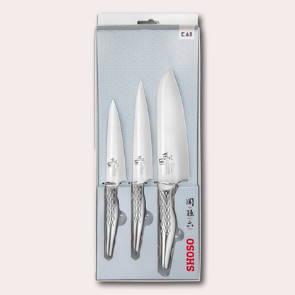 Kai Seki Magoroku 3 piece set, santoku, utility and paring knives. 5CR15MoV Steel with diamond pattern handle.