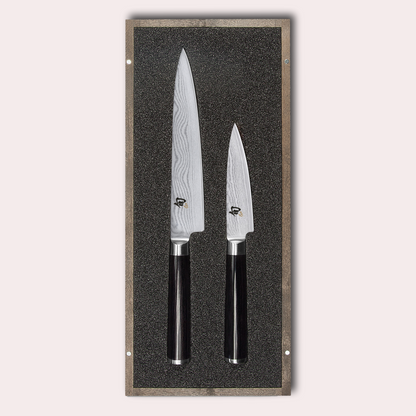 KAI Shun 2 piece set, utility and paring knives. Damascus blade with razor sharp edge and black pakkawood handle. 