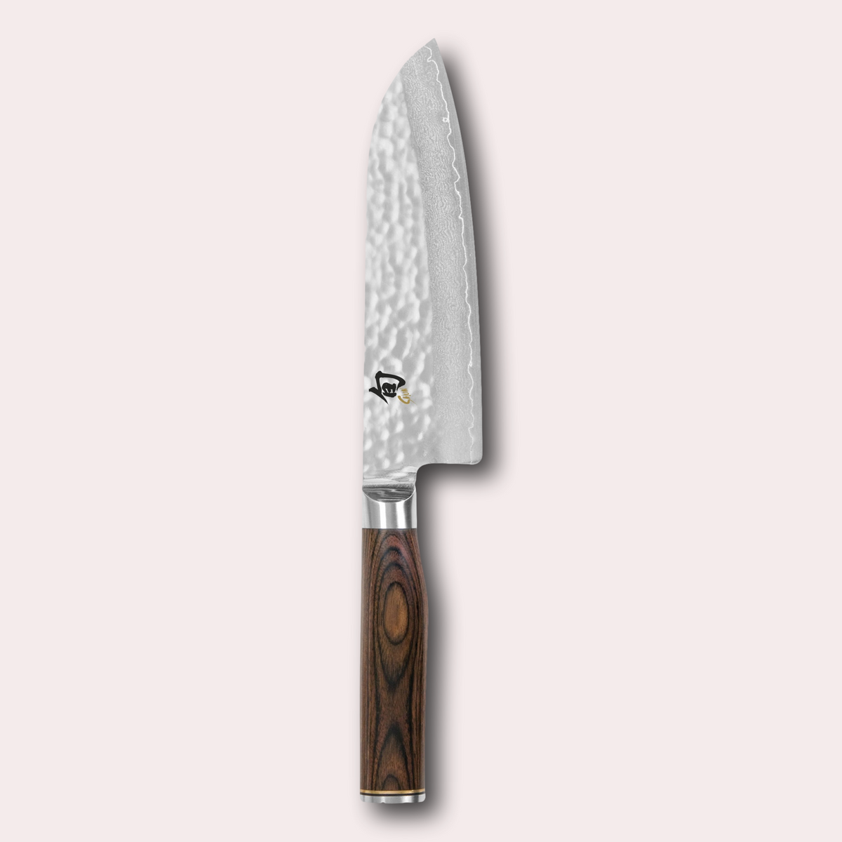 Kai Shun Premier santoku knife. VG max blade wrapped in 32 layers of Damascus steel with a hammered finish, and brown pakkawood handle. japanese-knives.co.uk