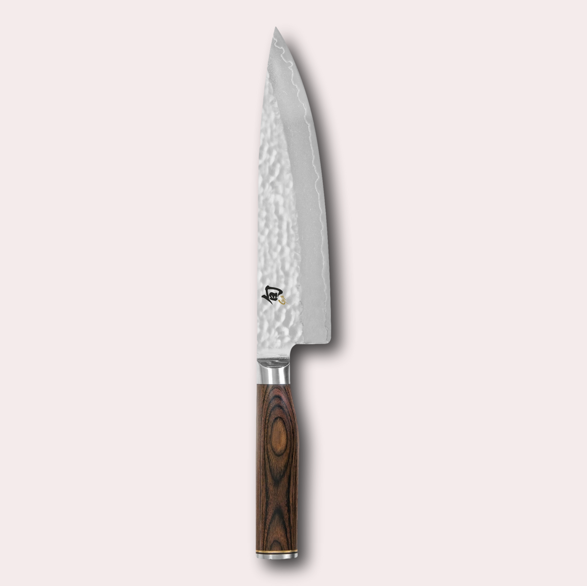 Kai Shun Premier chef knife. VG max blade wrapped in 32 layers of Damascus steel with a hammered finish, and brown pakkawood handle. japanese-knives.co.uk