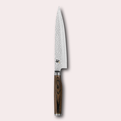 Kai Shun Premier serrated utility knife. VG max blade wrapped in 32 layers of Damascus steel with a hammered finish, and brown pakkawood handle. japanese-knives.co.uk
