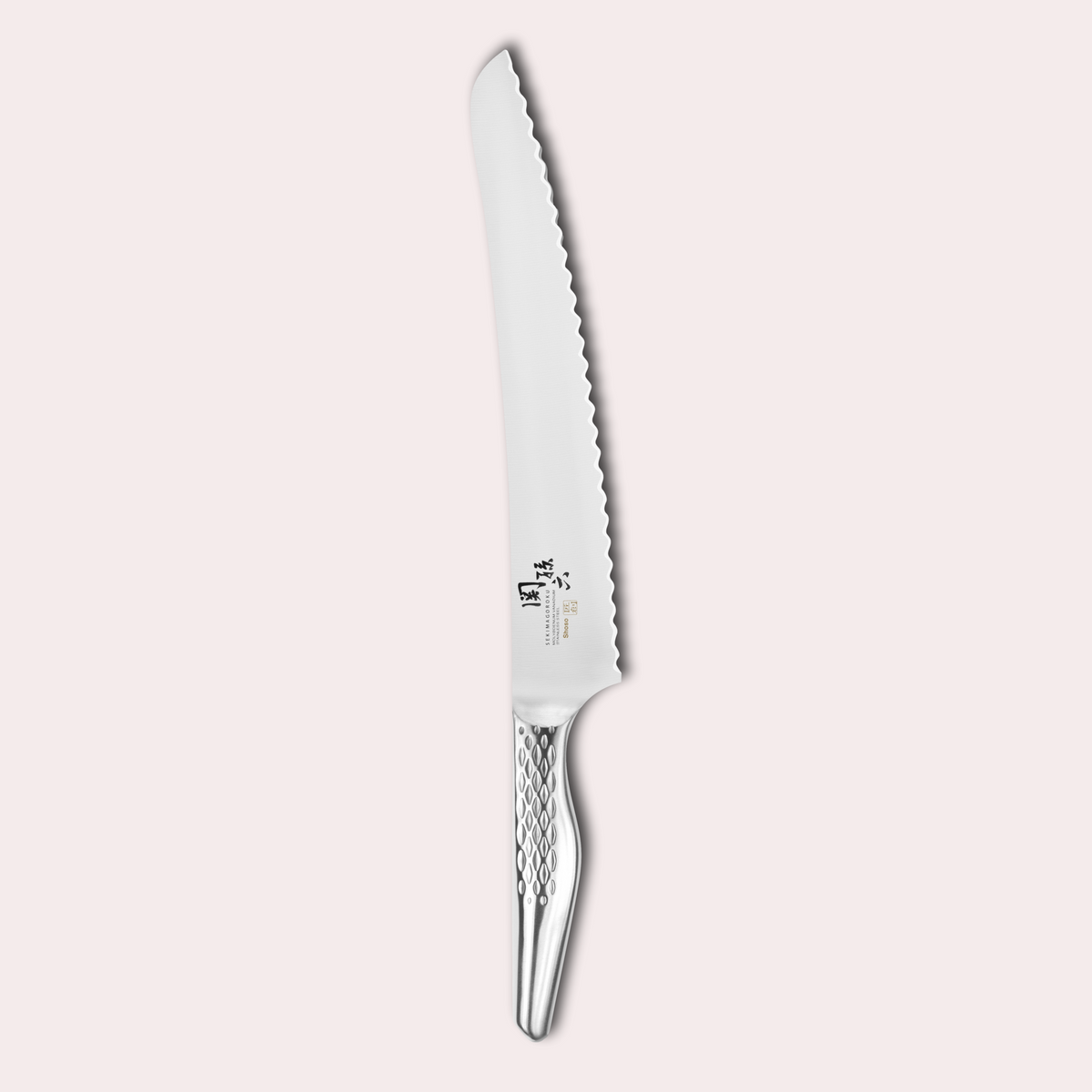 Kai Seki Magoroku Shoso Bread knife. 5CR15MoV Steel with diamond pattern handle.