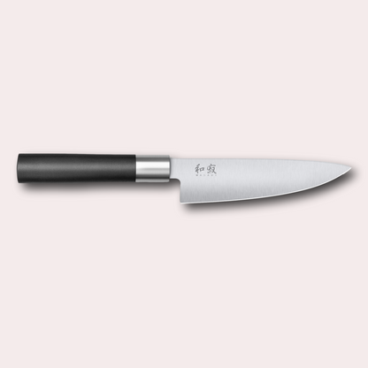Kai Wasabi Black Chef knife.  Corrosion-resistant 6A/1K6 steel, matte black oval shaped plastic handle.
