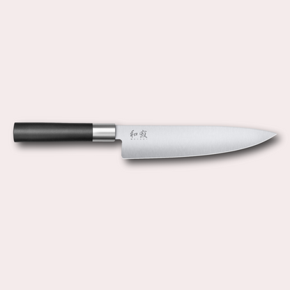 Kai Wasabi Black Chef knife.  Corrosion-resistant 6A/1K6 steel, matte black oval shaped plastic handle.