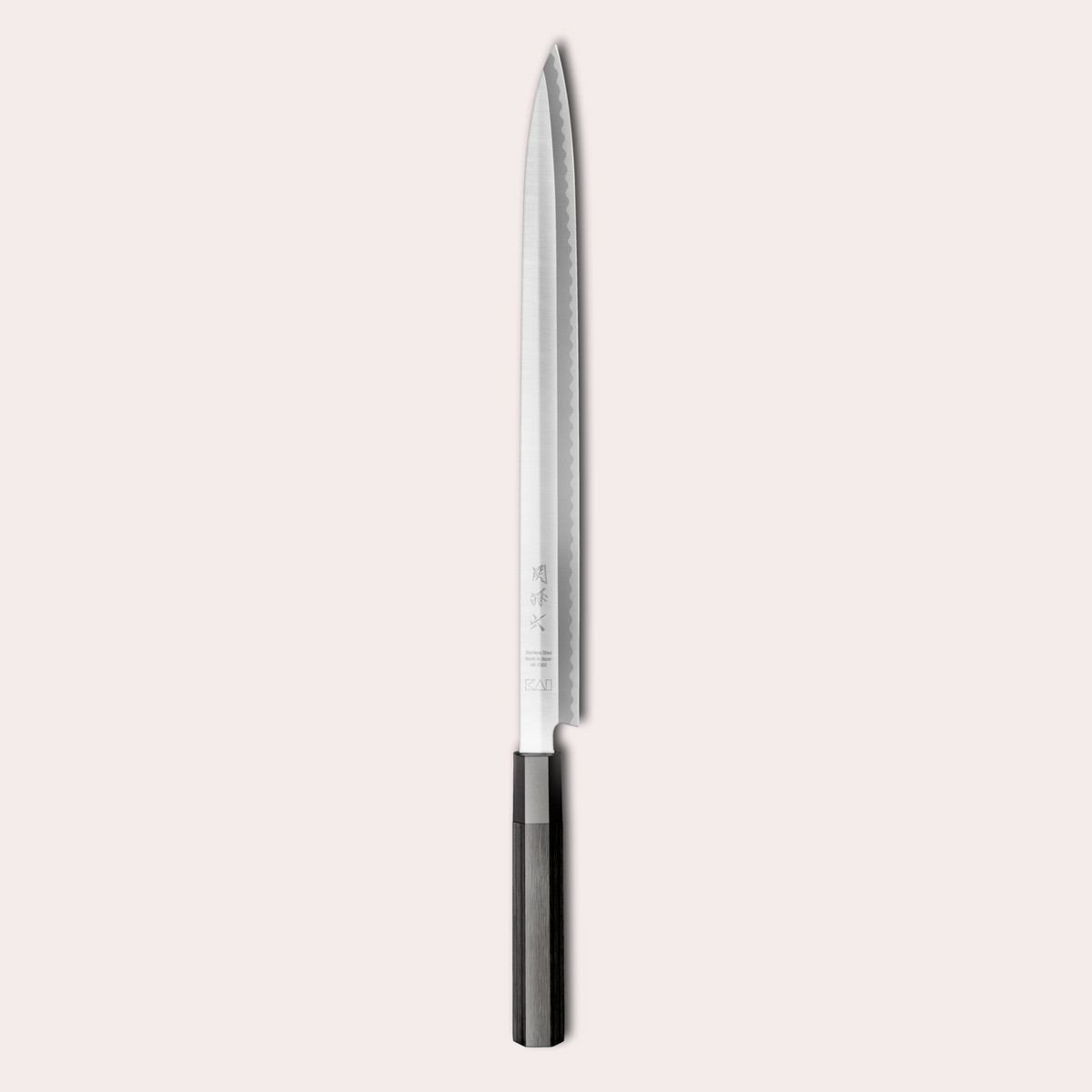 Kai Sekimagoroku KK Yanagiba knife. Long 8A steel blade, single bevel with black pakkawood handle.