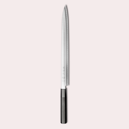 Kai Sekimagoroku KK Yanagiba knife. Long 8A steel blade, single bevel with black pakkawood handle.