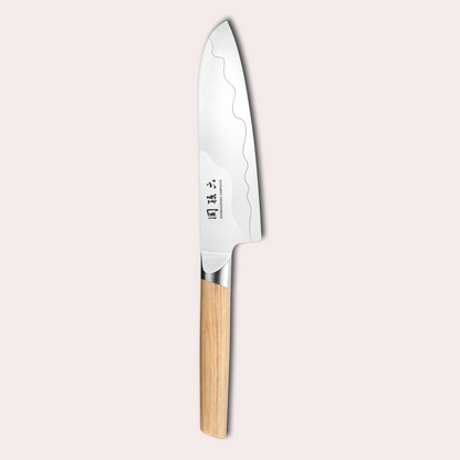 Kai Seki Magoroku Composite knife. Natural wood handle with the two grades of blade metal separated by a beautiful copper flash.