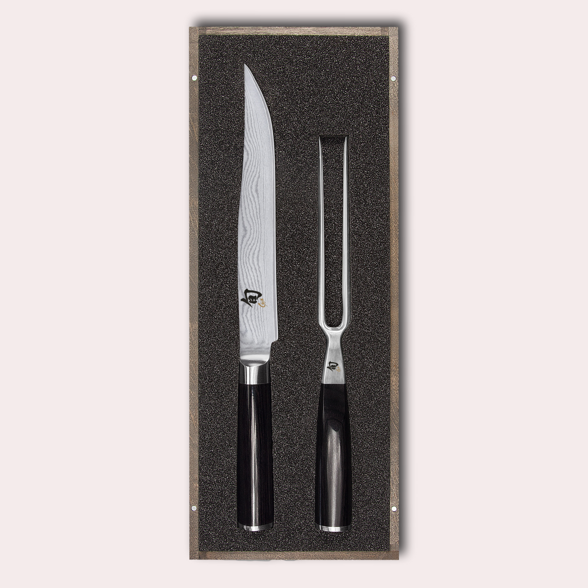 KAI Shun 2 piece carving set.  Damascus blade with razor sharp edge and black pakkawood handle. 
