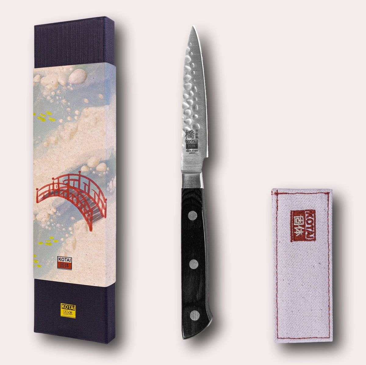 Kotai Hashi Tsuchime Paring knife.  Hammered finish blade and pakkawood sculpted handle.  Supplied by japanese-knives.co.uk