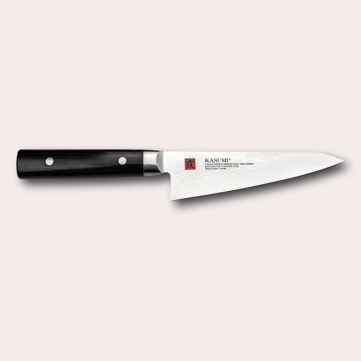 Kasumi Damascus chef and utility knife.  32 layers damascus blade with a vg-10 core, and a black pakkawood handle.  Sold by japanese-knives.co.uk