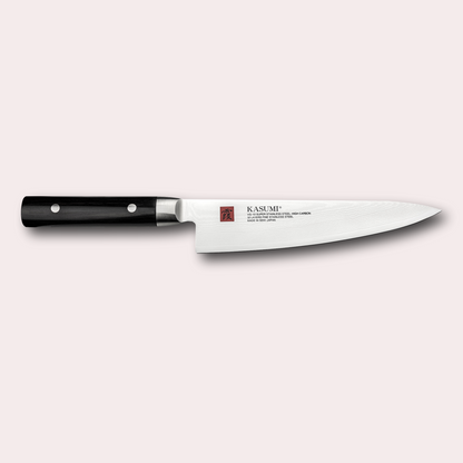 Kasumi Damascus Chef knife.  32 layers damascus blade with a vg-10 core, and a black pakkawood handle.  Sold by japanese-knives.co.uk