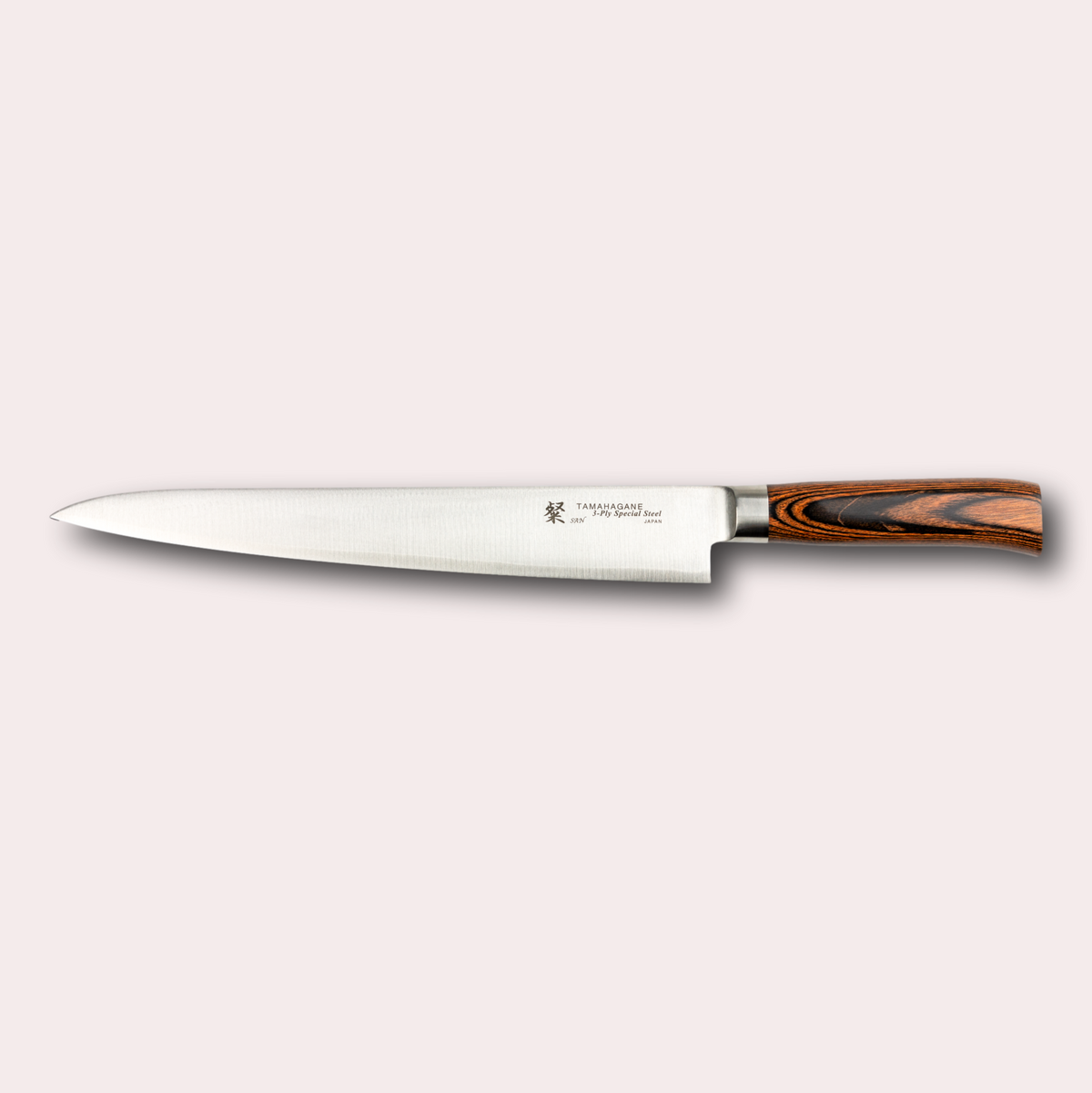 Tamahagane San 27cm slicing knife, with 3 ply special steel blade, and brown micarta handle.  Sold by japanese-knives.co.uk