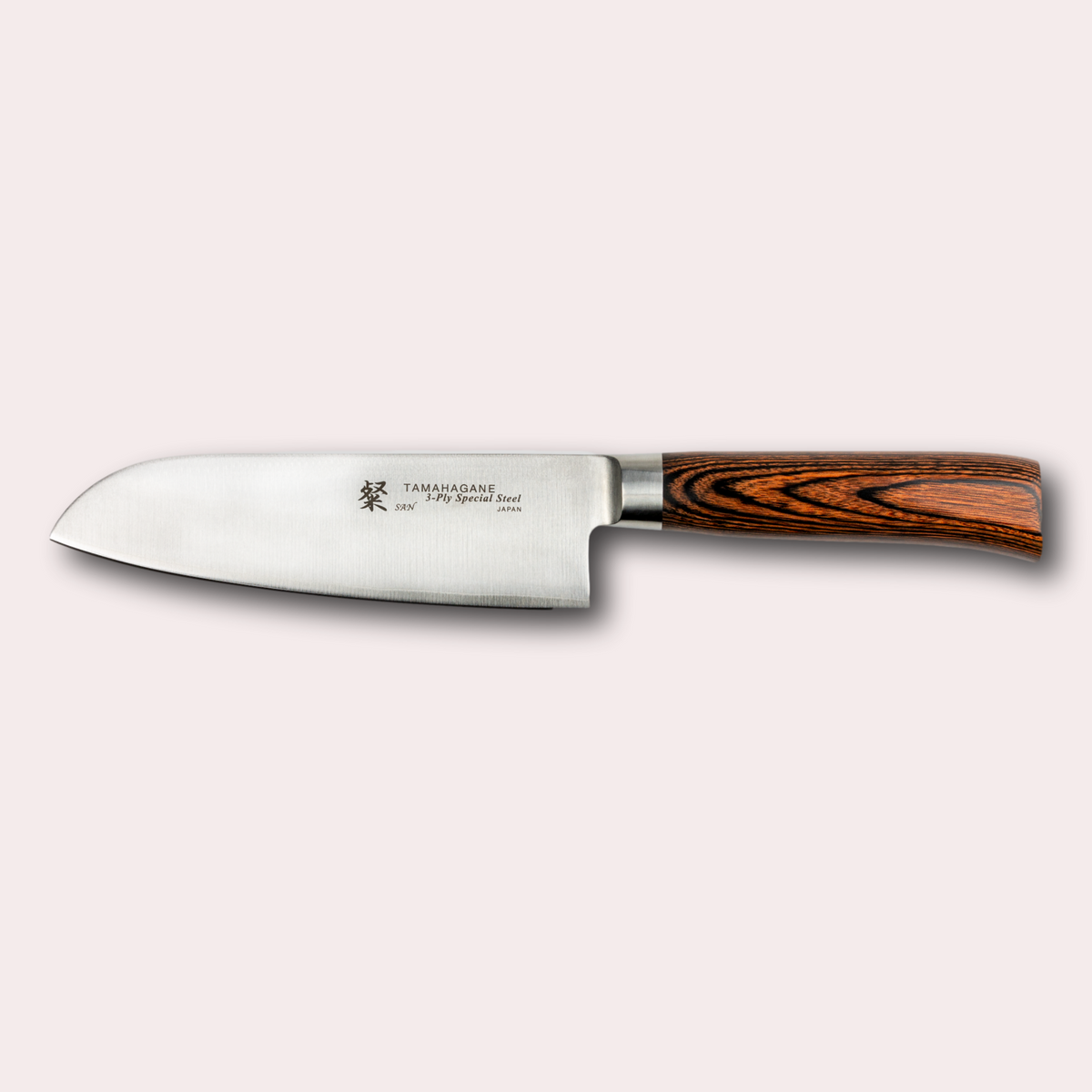 Tamahagane San Santoku knife, with 3 ply special steel blade, and brown micarta handle.  Sold by japanese-knives.co.uk