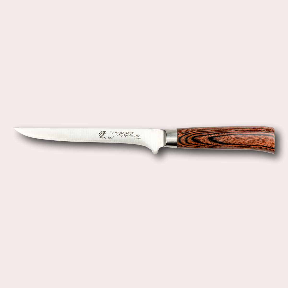 Tamahagane San boning knife, with 3 ply special steel rigid blade, and brown micarta handle.  Sold by japanese-knives.co.uk