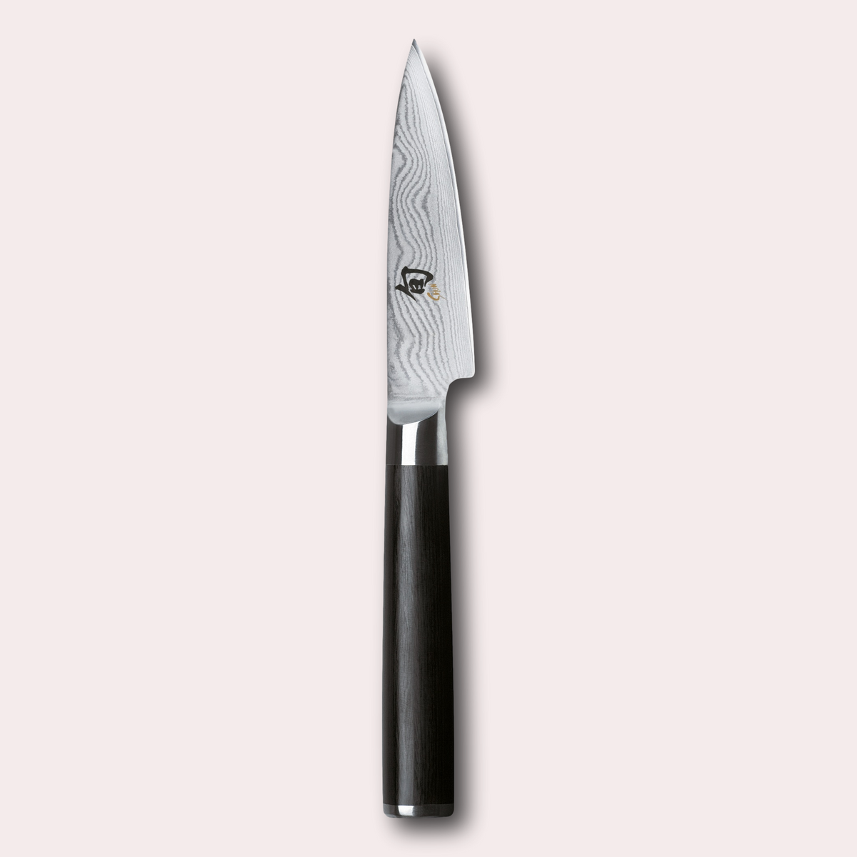 KAI Shun 9cm paring knife.  Damascus blade with razor sharp edge and black pakkawood handle. 